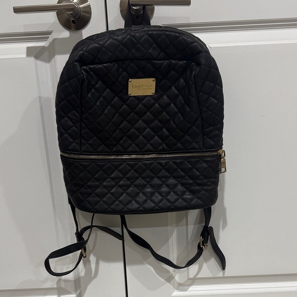 bebe Handbags - bebe Black Quilted Backpack with Gold Details